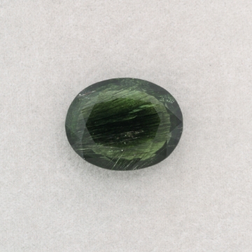 Show details for Tourmalated Peridot Oval Faceted Gemstone 24.8ct. 21x16mm Tourmalated Peridot Gemstone 24.8ct. 21x16mm Oval