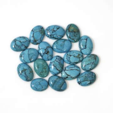 Show details for Turquoise 17pc Oval Cabochon Lot 111.51ctw G1162927P Turquoise 17pc Oval Cabochon Lot 111.51ctw. Stabilized Spiderweb Turquoise G1162927P