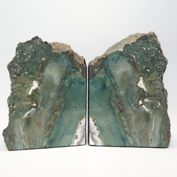 Show details for Geary Blue Green McDermitt Oregon Petrified Wood Bookends Geary Blue Green McDermitt Oregon Petrified Wood Bookends Felt lined can be orientated in two directions. FOR THE DESK, OFFICE, LIBRARY OR GIVE AS A GIFT!