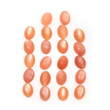 Show details for Peach Cat's Eye Moonstone 7x5mm Oval Shape Parcel Peach Moonstone 7x5mm Oval Shape Parcel